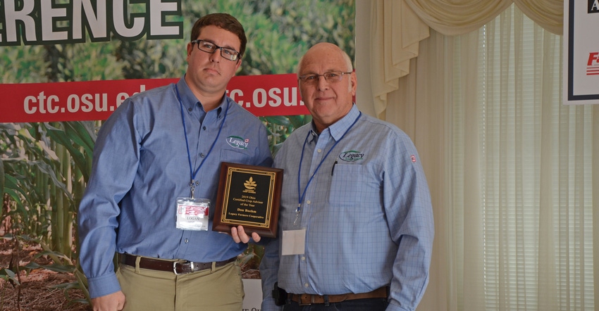 Don Boehm (right) was presented the 2019 Certified Crop Advisor of the Year award by Logan Haake, chairman of the Ohio CCA bo