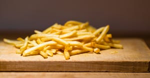 French fries on a wooden table