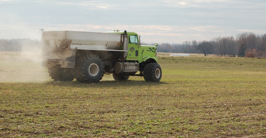 truck applying fertilizer truck applying fertilizer