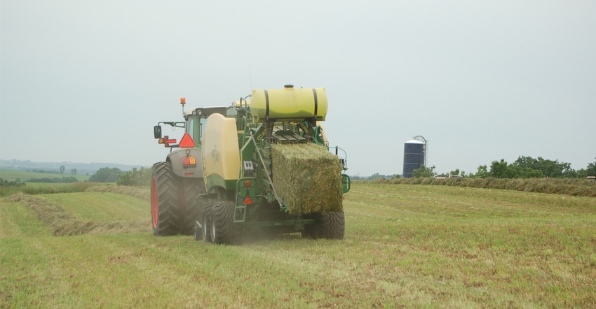 Tractor in alfalfa field 