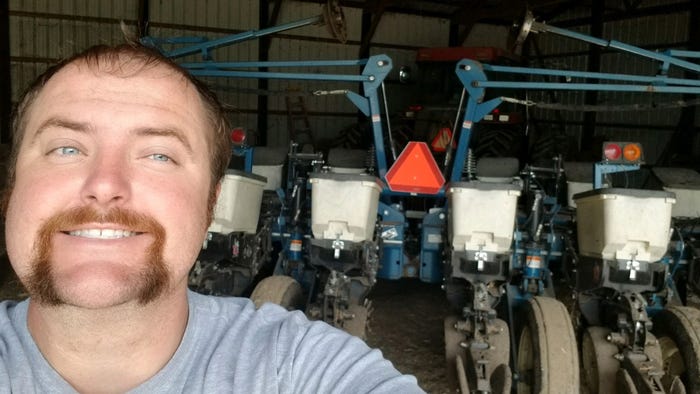 Brian Tuttle in front of planter Brian Tuttle in front of planter