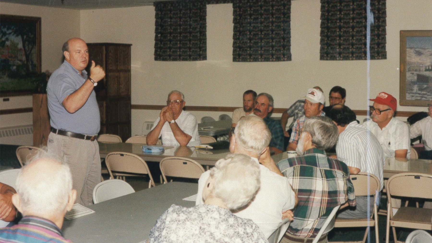 Marty Strange, speaks to a group of farmers at a meeting some time in the early 1990s