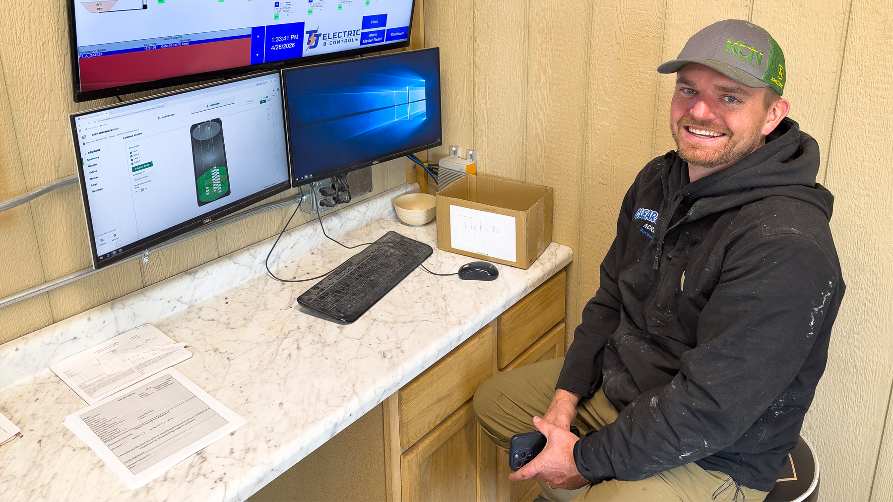 Jack Fehr monitors grain bins from a work station using AGI SureTrack and BinManager systems