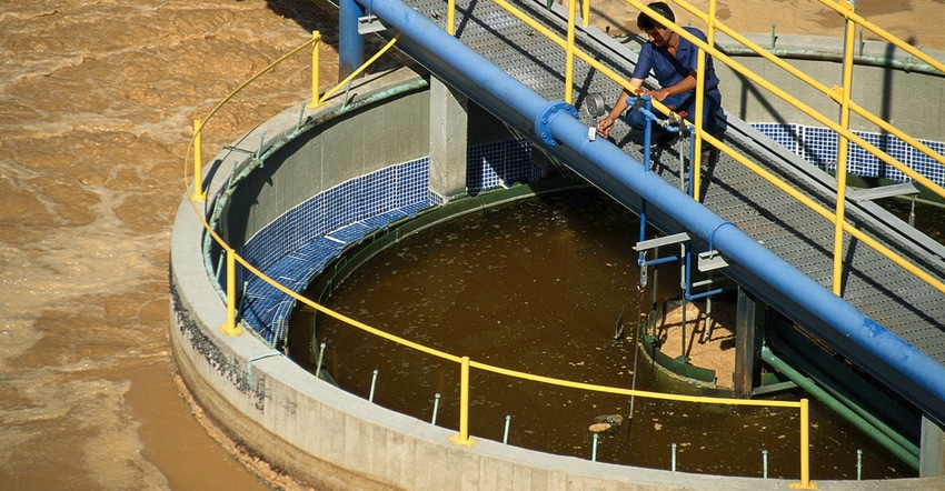 worker in water treatment plant
