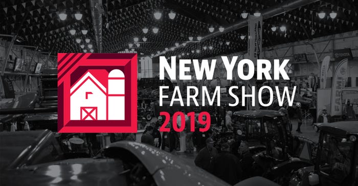 New York Farm Show Logo against darkened aerial photo of exhibit space