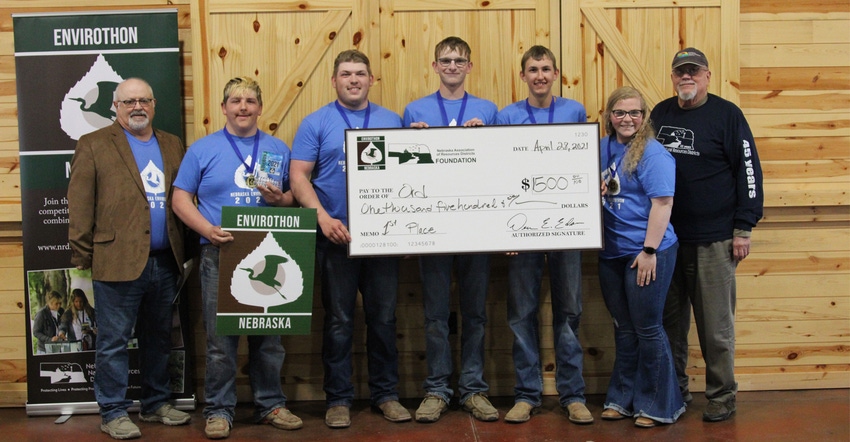  Jim Eschliman, NARD president and Lower Loup NRD director and the Ord team that won the state Envirothon competition 