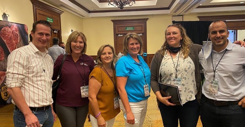 four Wisconsin Beef Council members flanked by two Costa Rican importers