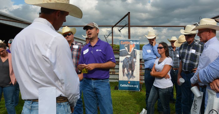Brandon Depenbusch, center in purple shirt, with Innovative Livestock Services, explained how the system works