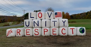 Dicken Crane and his employees have painted new bales with a message: love, unity, respect