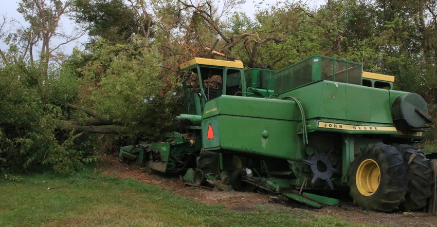 fallen trees on John Deere farm equipment