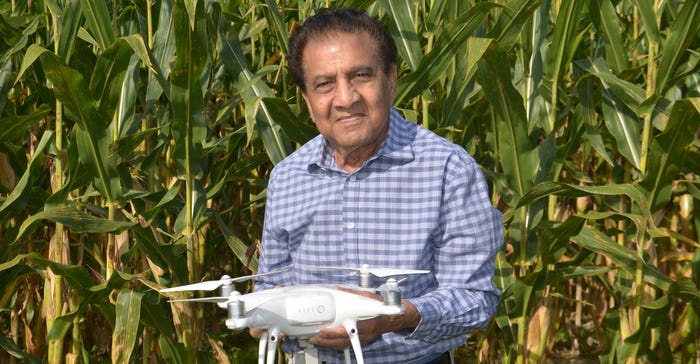 Dave Nanda holds a drone