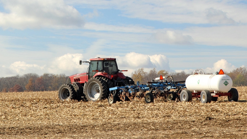 Tractor and anhydrous tank in corn stubble