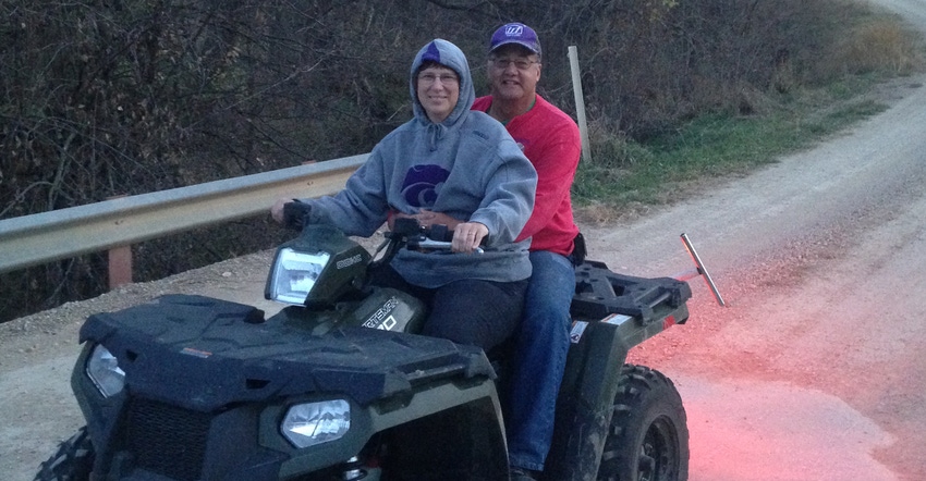 Mark and Joanne Noll on a four wheeler Mark and Joanne Noll on a four wheeler