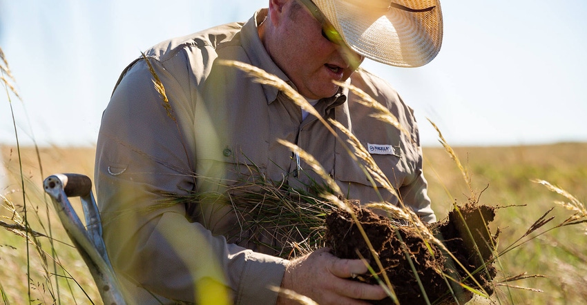 jeff goodwin inspects soil