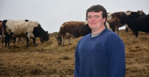 Ryan Murray at his organic dairy farm with cows on pasture