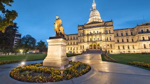 The Michigan state capitol building in evening light