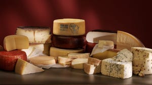 a display of various types of cheeses