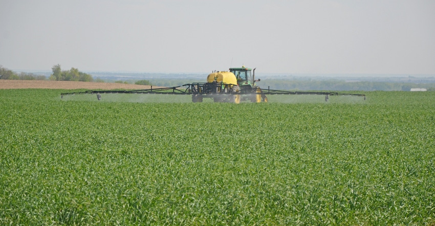 sprayer in cover crops field
