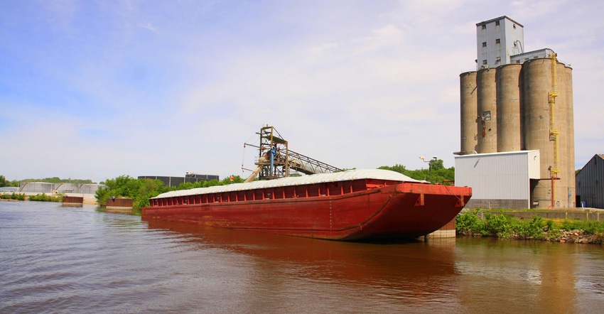 Grain barge traveling Mississippi River