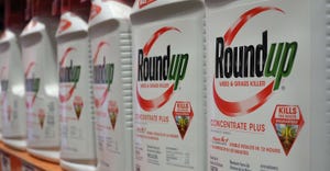 Jugs of Roundup herbicide