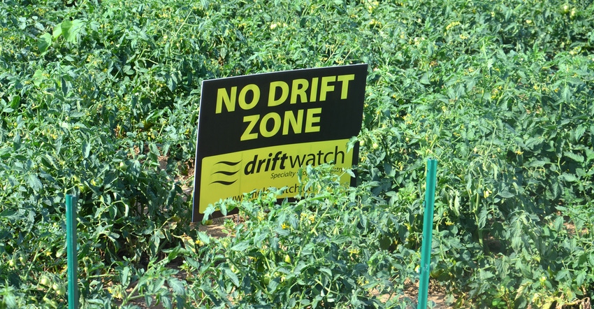 No Drift Zone sign in field