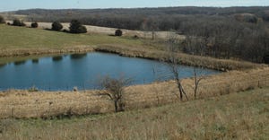 farmland property with a pond