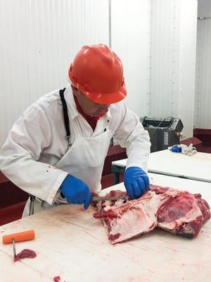 Jake_Cutting Meat.jpg