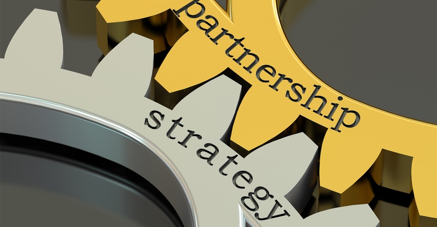 Strategy-partnership concept on the gearwheels Strategy-partnership concept on the gearwheels