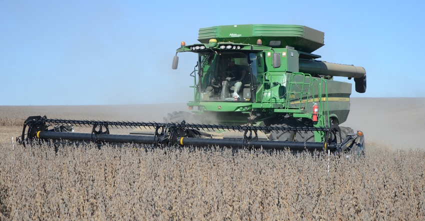 A photo from 2018 in which Jimmy Frederick harvests 138-bushel rainfed soybeans – with planting populations around 50,000 p