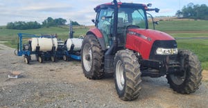 tractor pulling fertilizer tanks for application