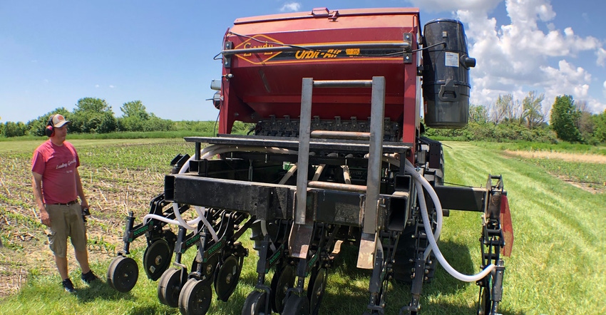A four-row interseeding machine plants two rows of cover crops between the corn rows