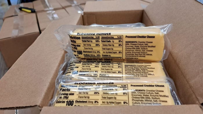 packaged blocks of cheese in a box
