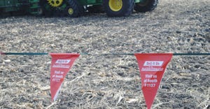 Safety pennants by Colby Canvas hanging in field at HHD demonstrations