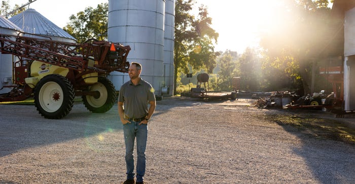 Joel Barickman looks out over the Barickman farm during a early, sunny morning Joel Barickman looks out over the Barickman farm during a early, sunny morning