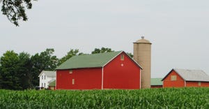 Barn and silo and corn field