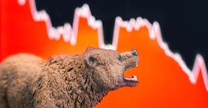 Bearish scenario in stock market with bear figure in front of red price drop chart.