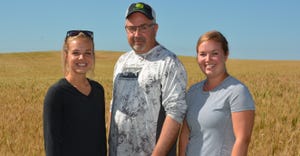 Kari Olson, Rob Olson and Nicole Strafelda on the family farm
