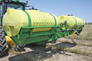 PATRICK TURNAGE’S front-mounted tanks cost less than half the price of side-mounted tanks.