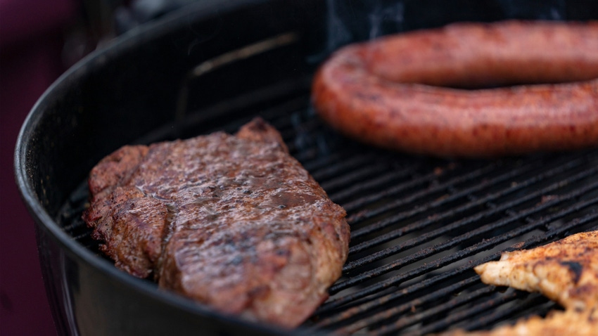 Grilling steak, sausage, and chicken