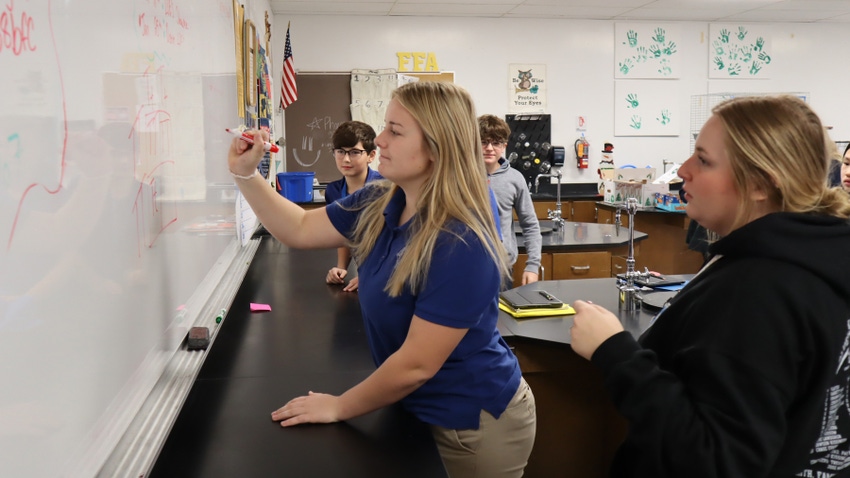 Members of the St. Cecilia FFA in school teaching students