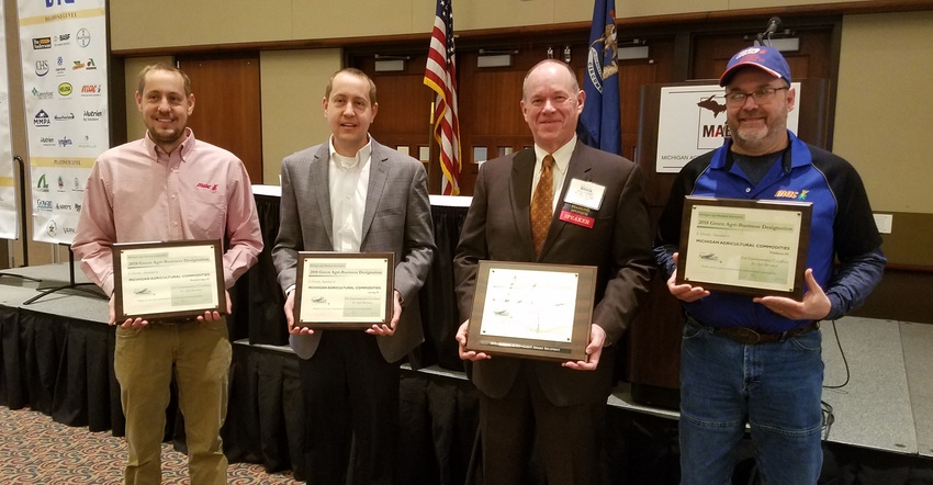 Michigan Agricultural Commodities won the 2018 Outstanding Green Agri-Business Award. Pictured are (from left) Adam Geers, Br