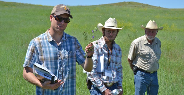 3 men presenting at grazing workshop