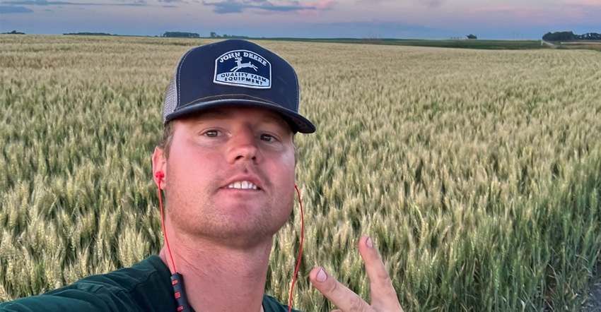 Blake Segerholm selfie with soybean field in background Blake Segerholm selfie with soybean field in background