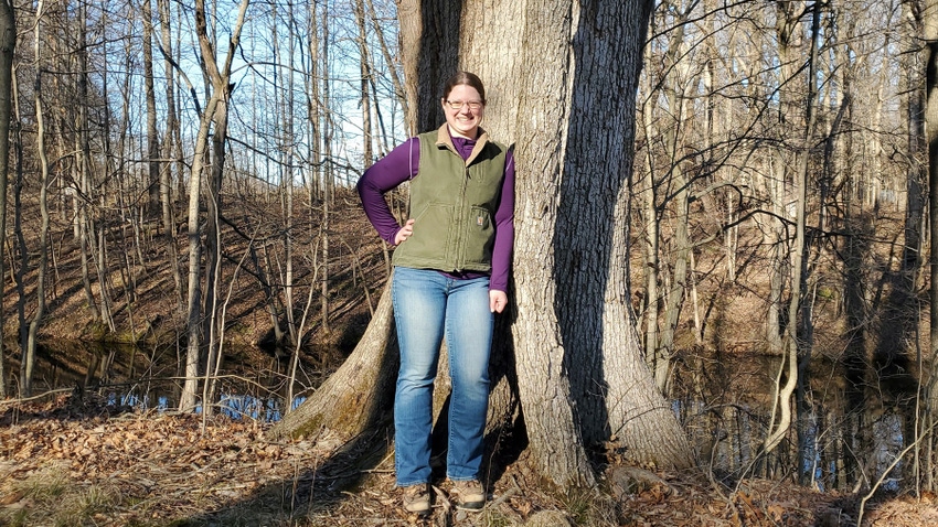 Amanda Kautz standing in front of a tree Amanda Kautz standing in front of a tree