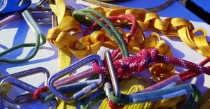 colorful safety harness, ropes, carabiners