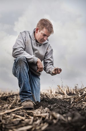 farmer Darin Stolte in a field