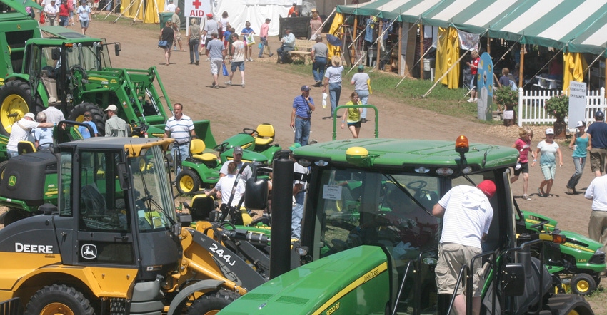 Attendees of Wisconsin Farm Technology Days looking at farm equipment