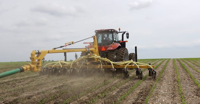 Nitrogen being applied in field