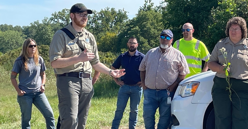 Justin Emmons speaking to attendees at a field day at the Salamonie River State Forest Justin Emmons speaking to attendees at a field day at the Salamonie River State Forest