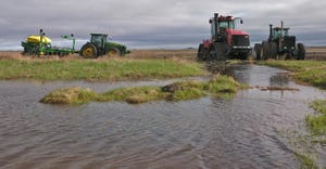 equipment stopped in flooded field